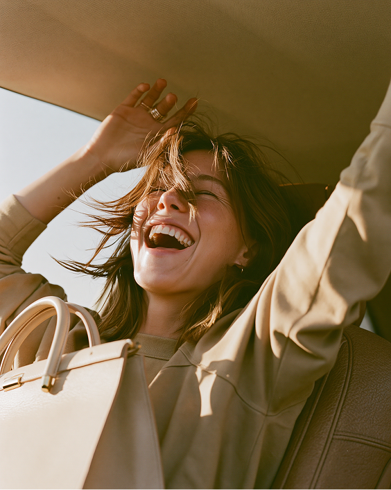 Luxury bag campaign — laughing in car