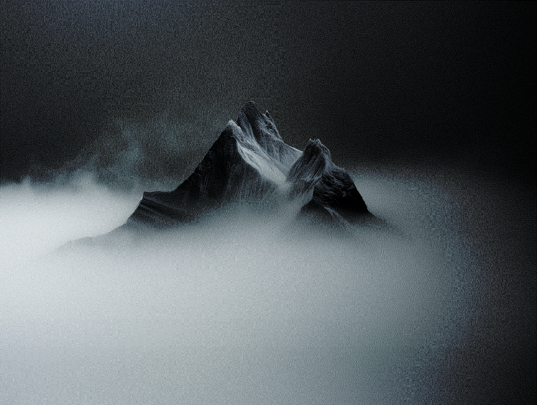 Mountain emerging from fog