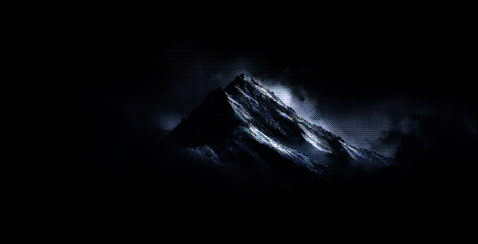 Mountain emerging from fog