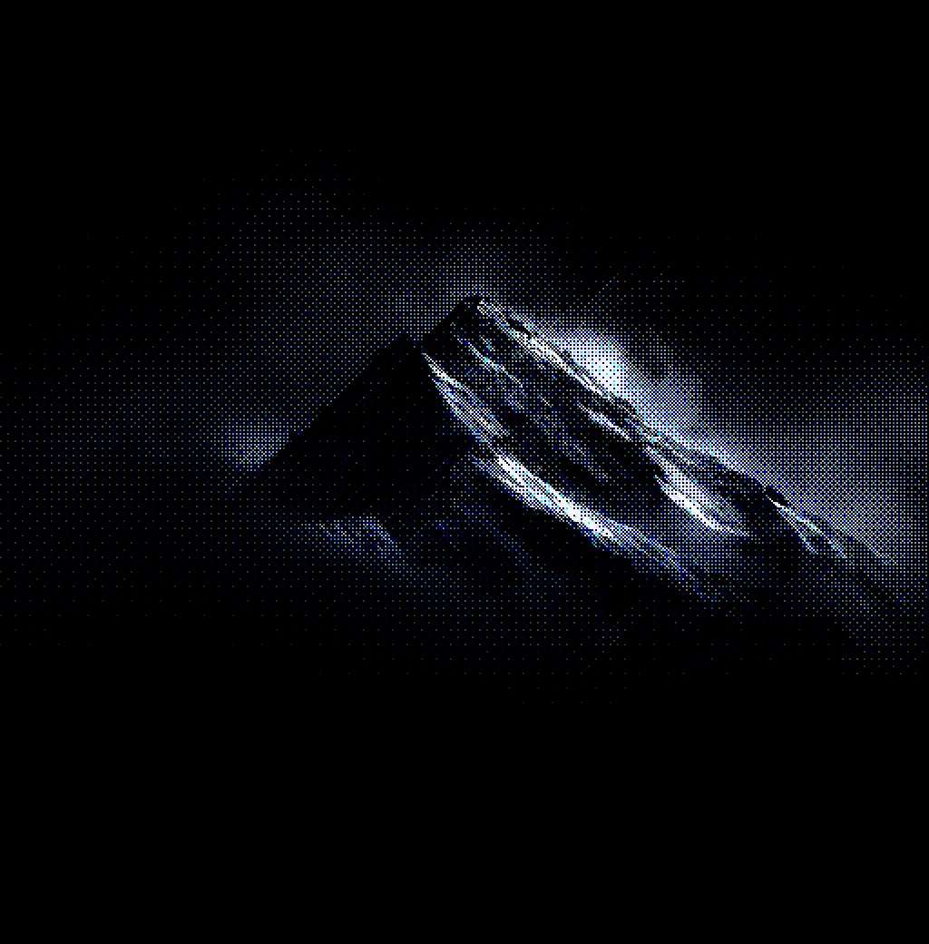 Mountain emerging from fog